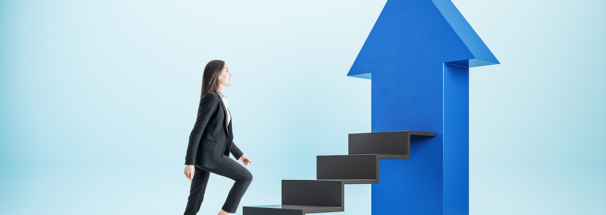 A woman climbing a ladder
