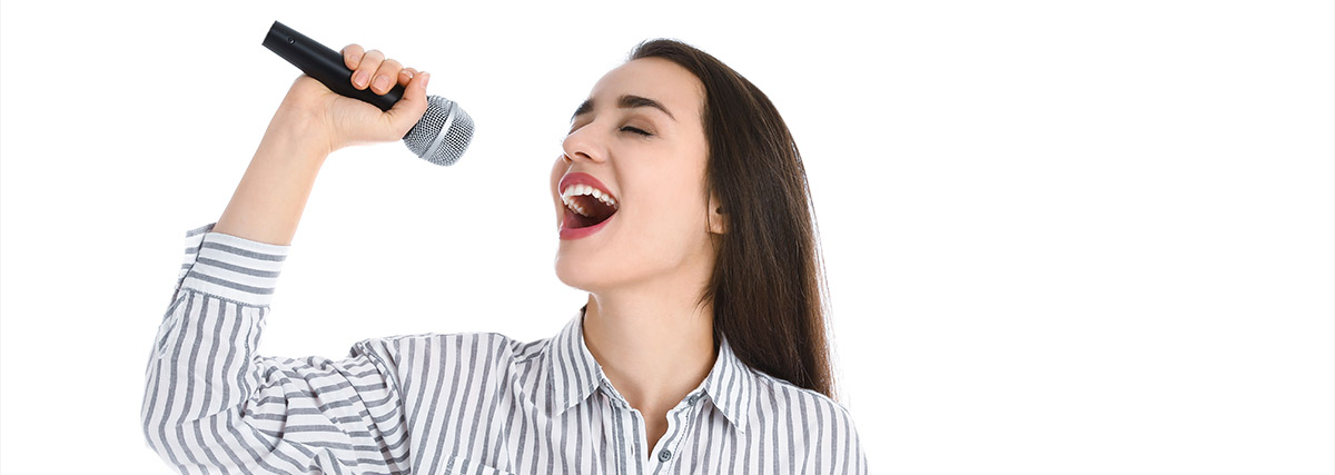 Woman singing high notes